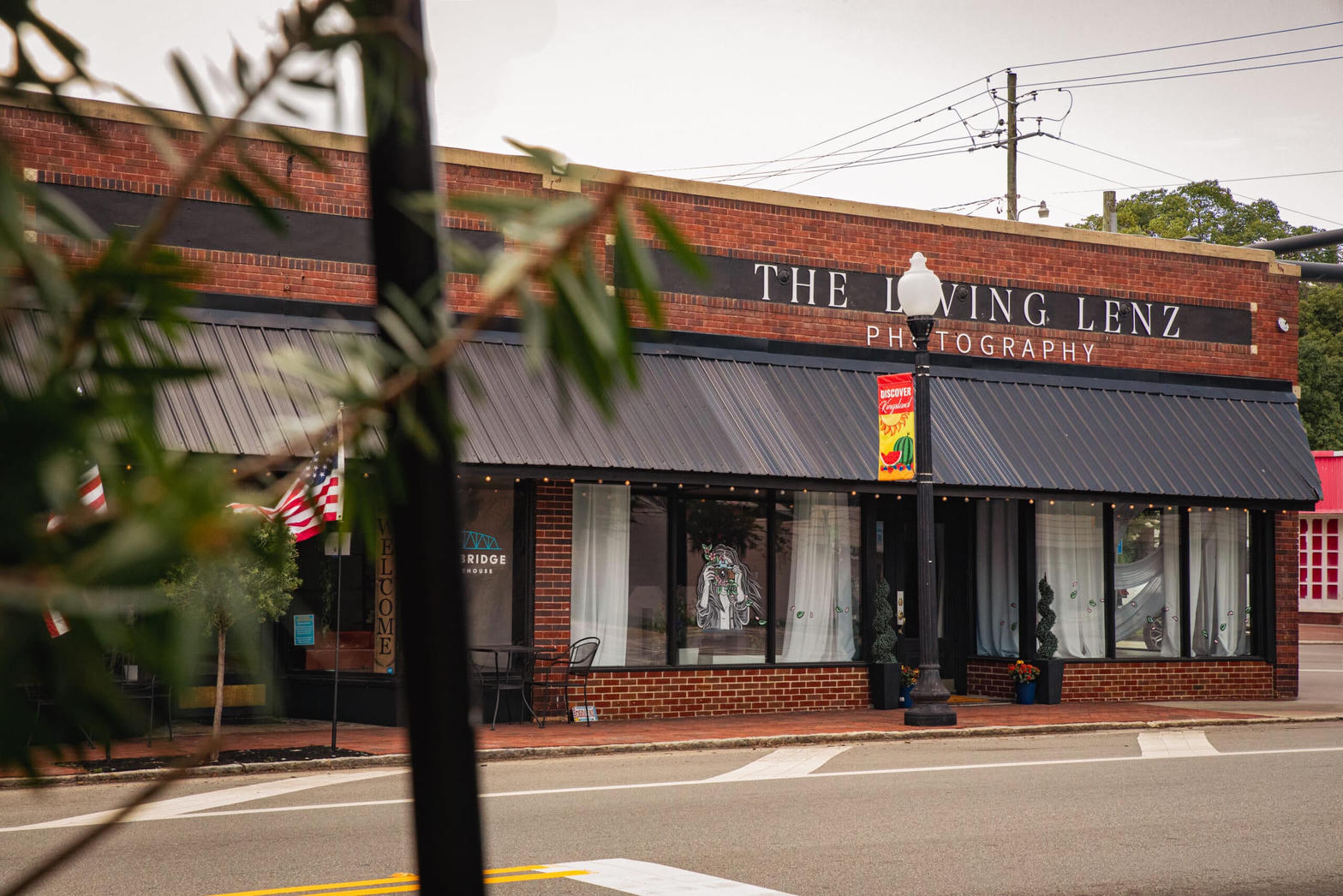 Brick storefront with black awning