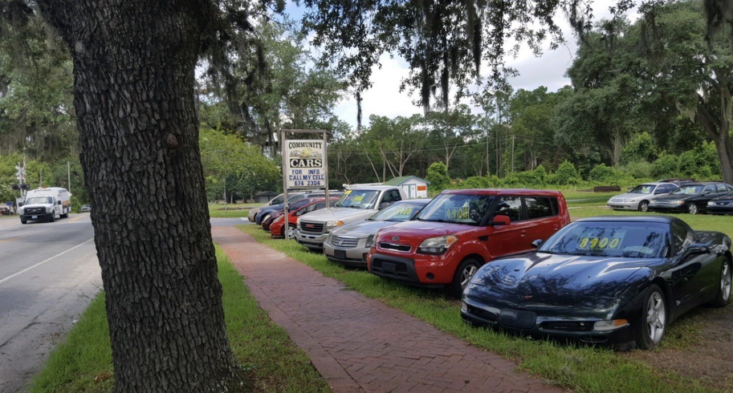 Community Cars lot under the oak